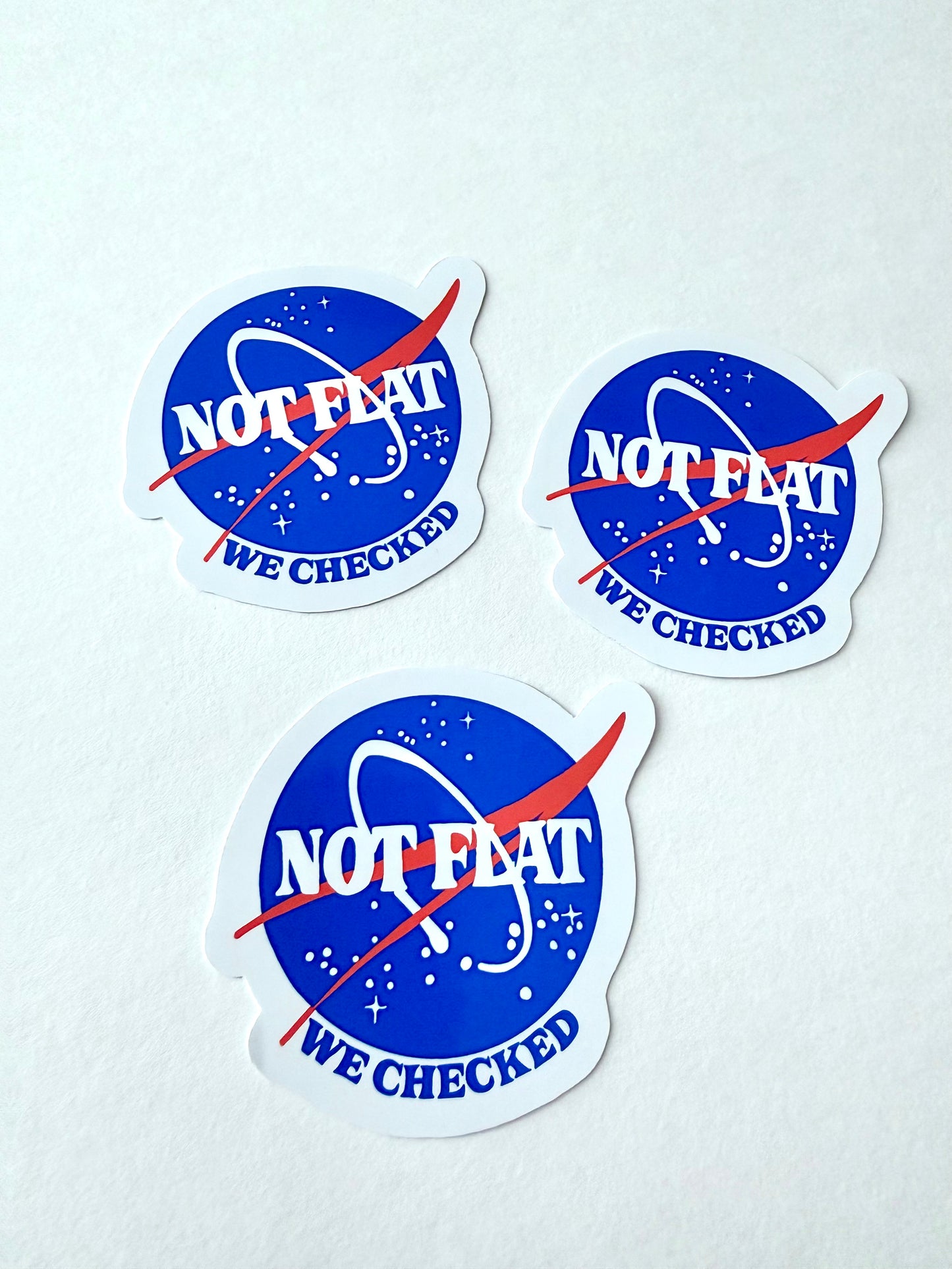 Space Humor Sticker – “Not Flat, We Checked” | Retro Space Aesthetic Vinyl Decal